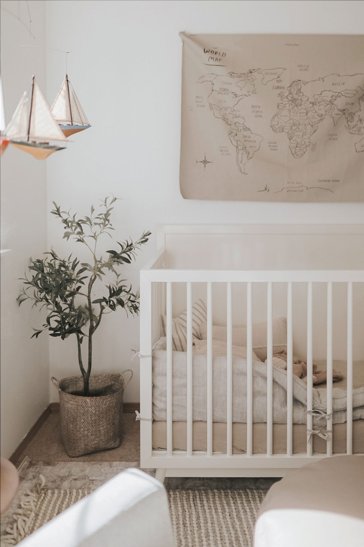 Light Airy Kids Room with Olive Tree, Crib, and Light Toned Walls After Preset Application
